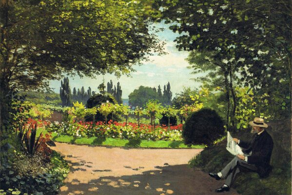 A man in a hat reads a newspaper in the park