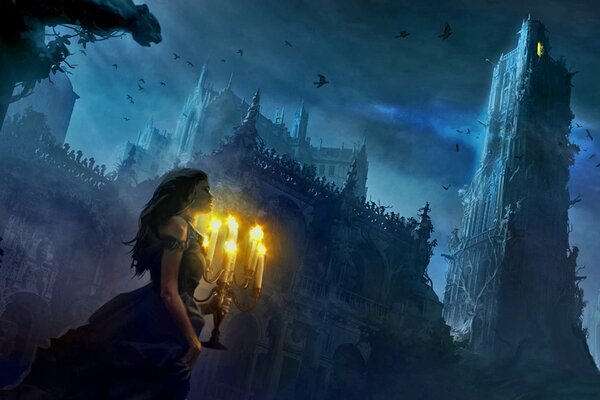 A girl at night with candles walks against the background of a castle