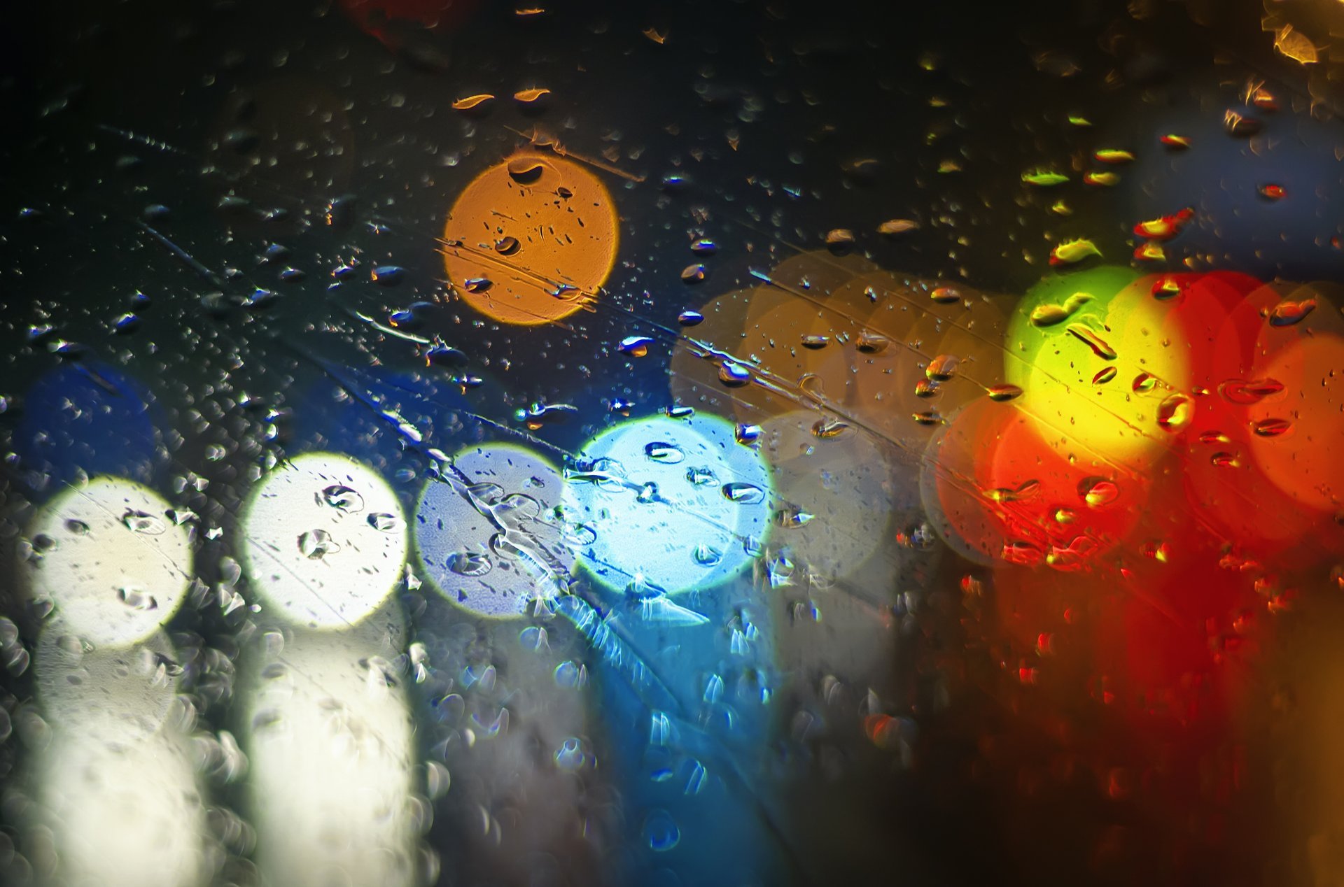 glass drops rain lights colored bokeh light