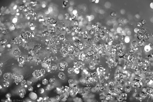 Diamante dispersión de gotas de agua en macro