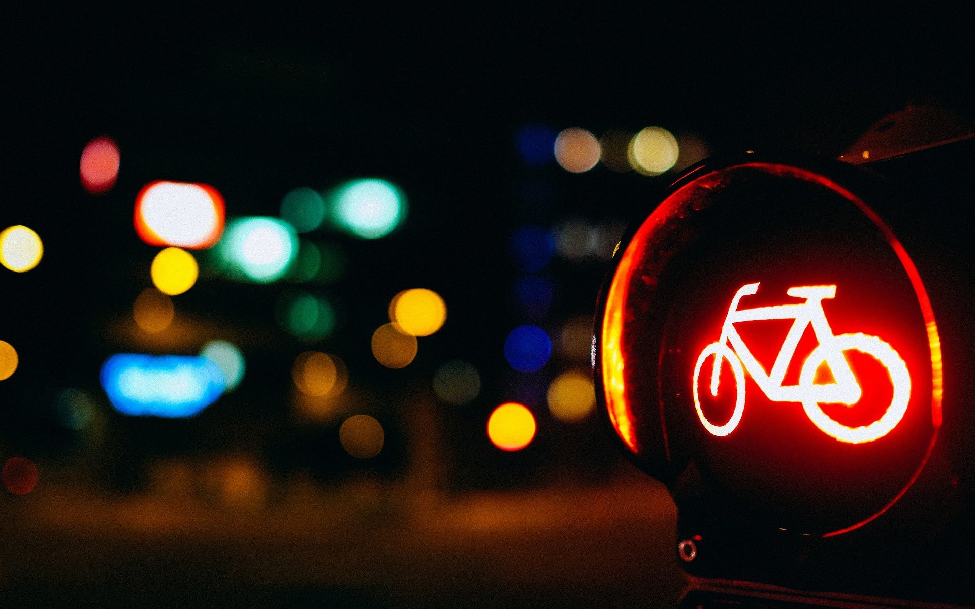 close up traffic sign lights bike red road blur bokeh background macro wallpaper widescreen full screen hd wallpaper