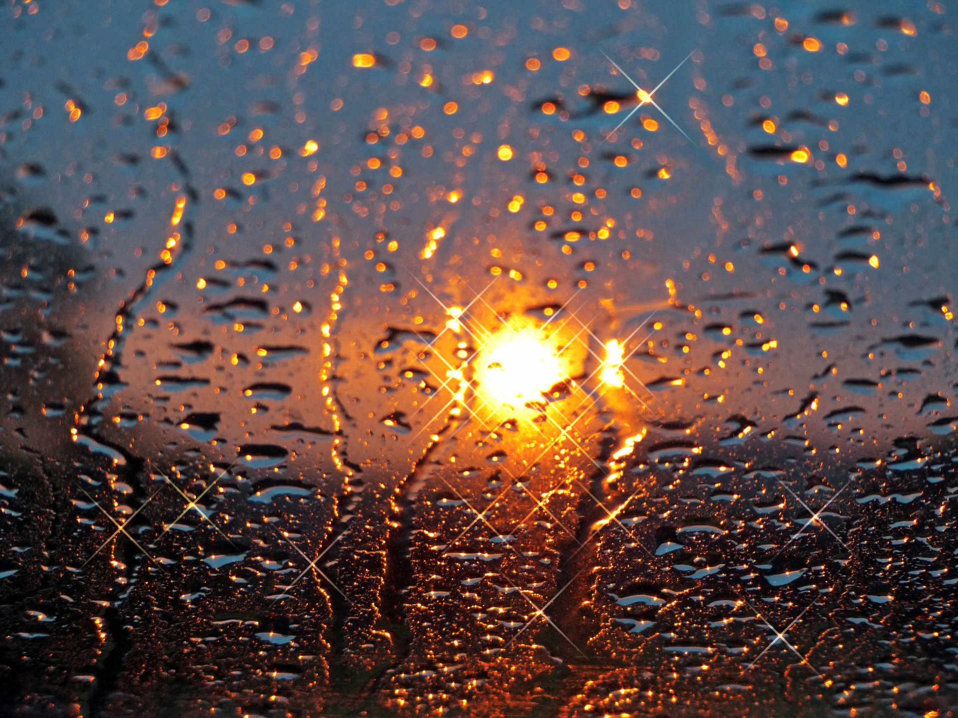 glass drops rain sun sunset