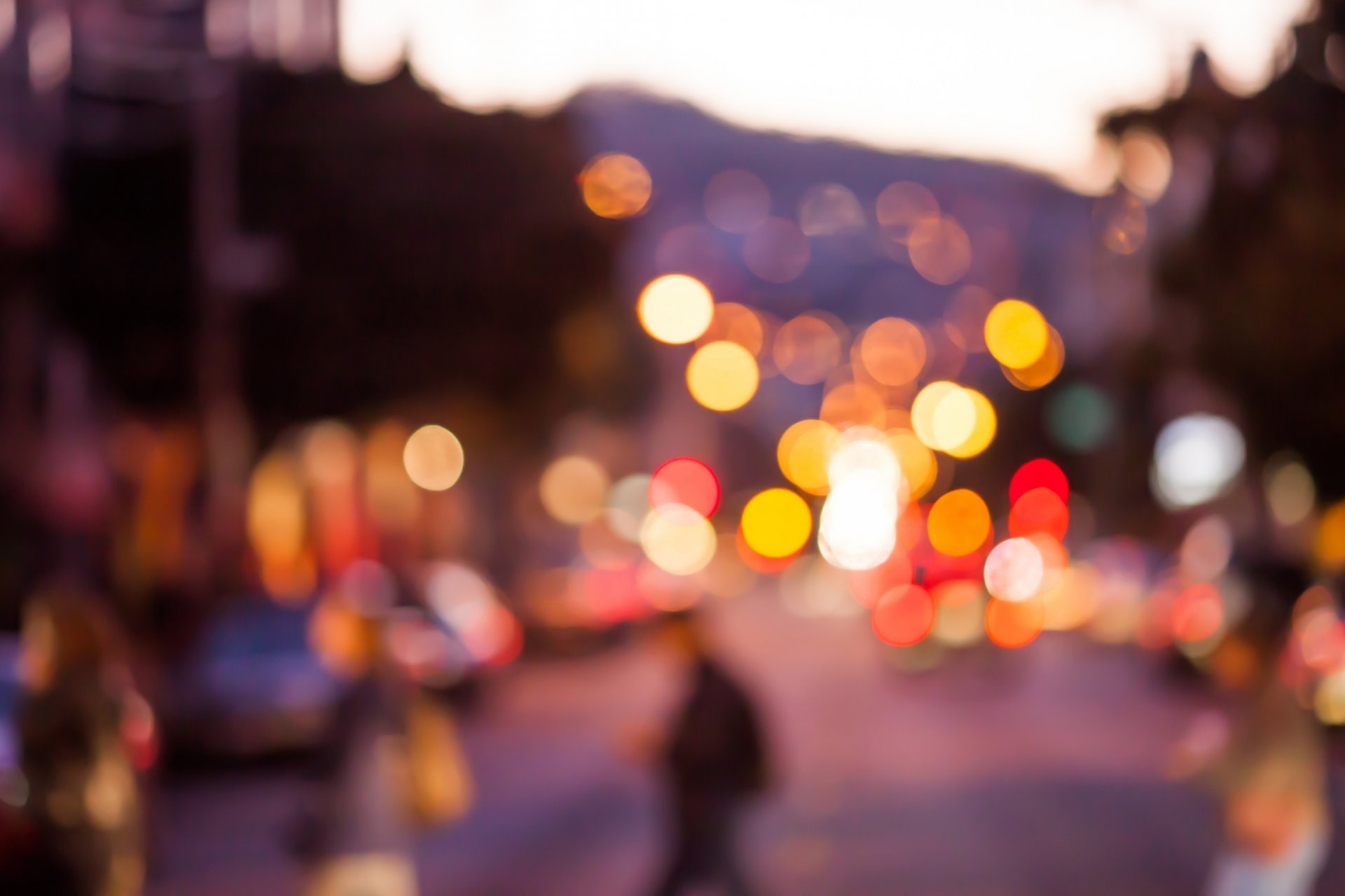 bokeh lights colored town street people machinery