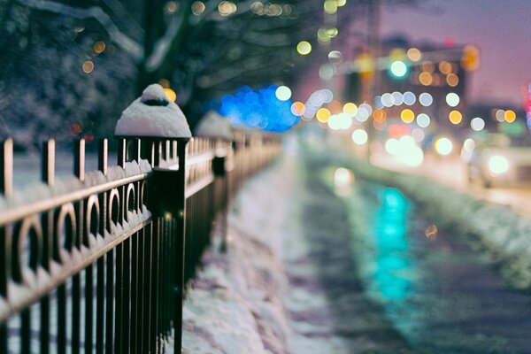 Winter background with lights and gates