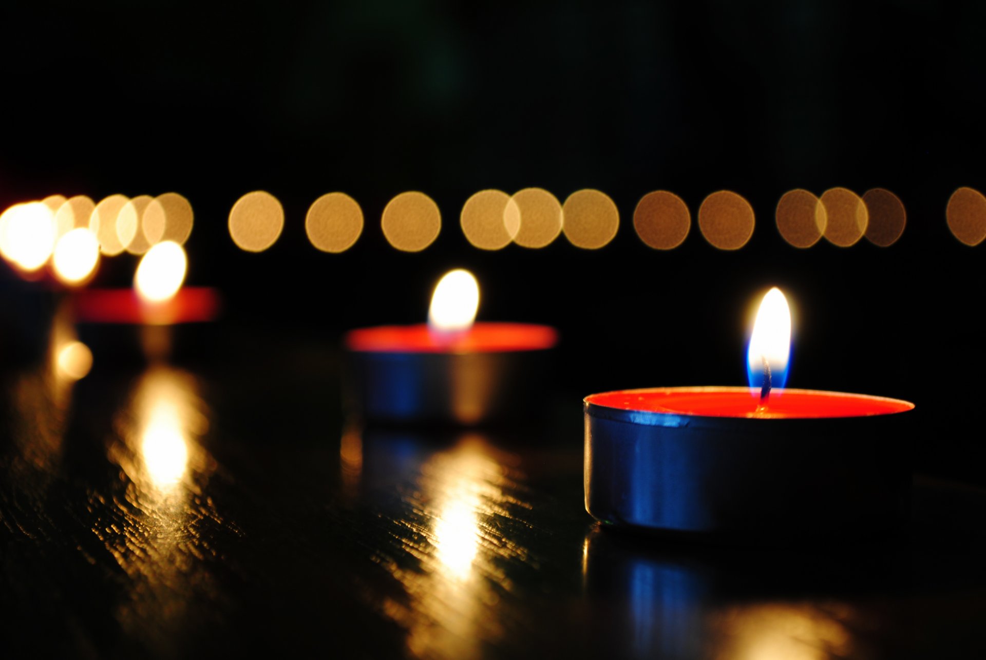 candles reflections fire red reflection bokeh