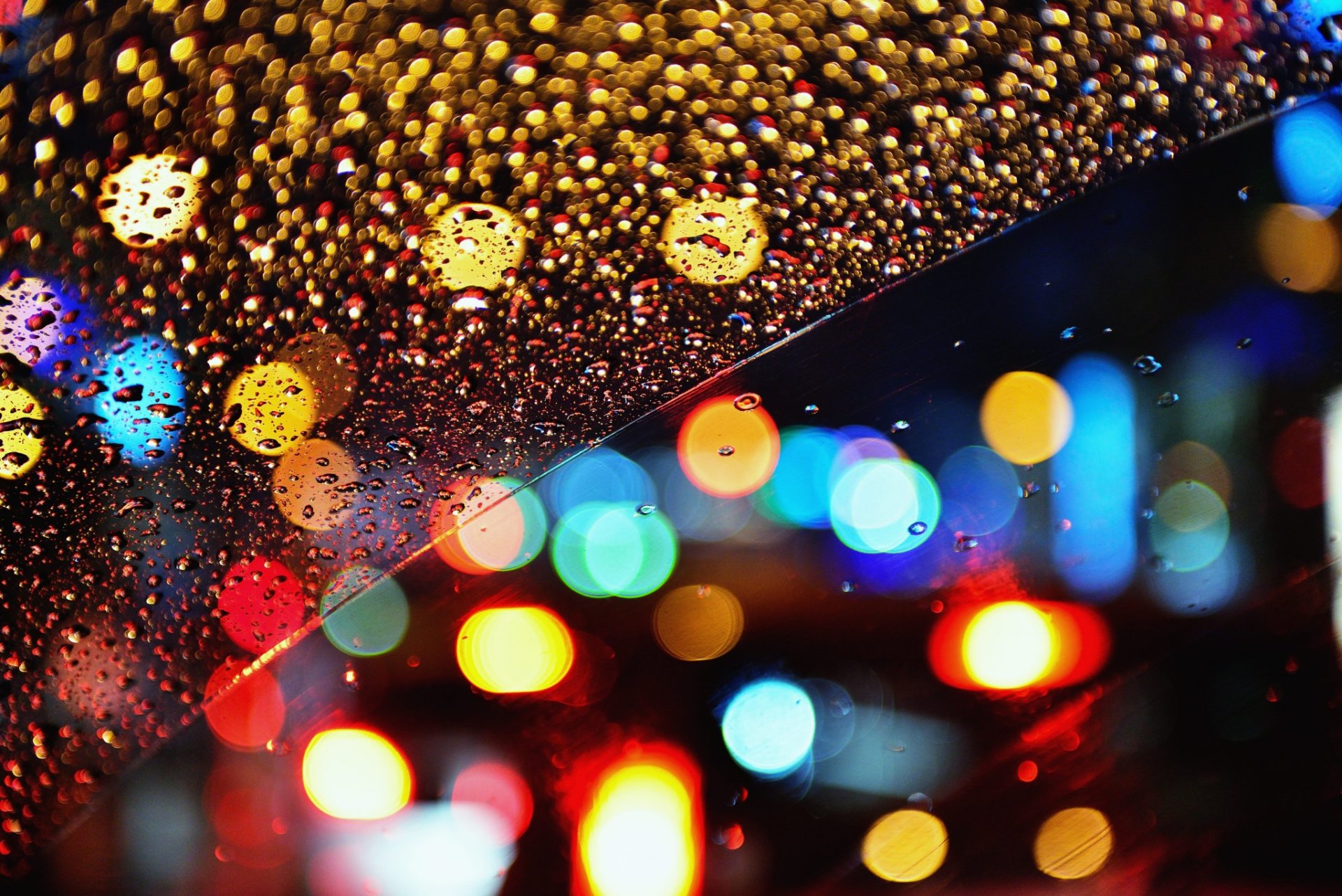 vidrio lluvia gotas bokeh luces noche