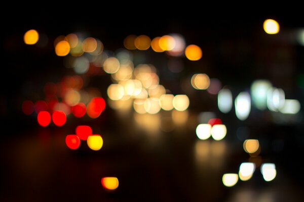 Lumières floues dans la nuit à Bangkok