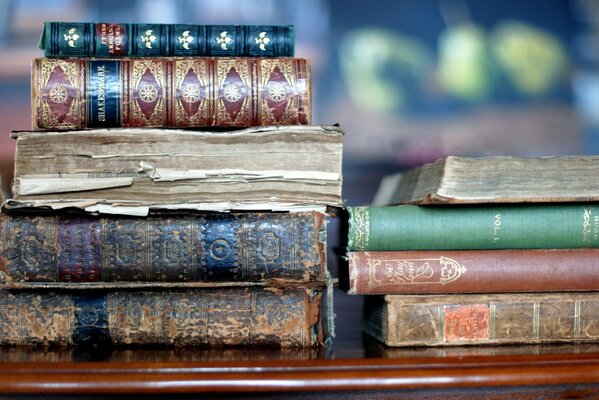 A stack of old books on the table