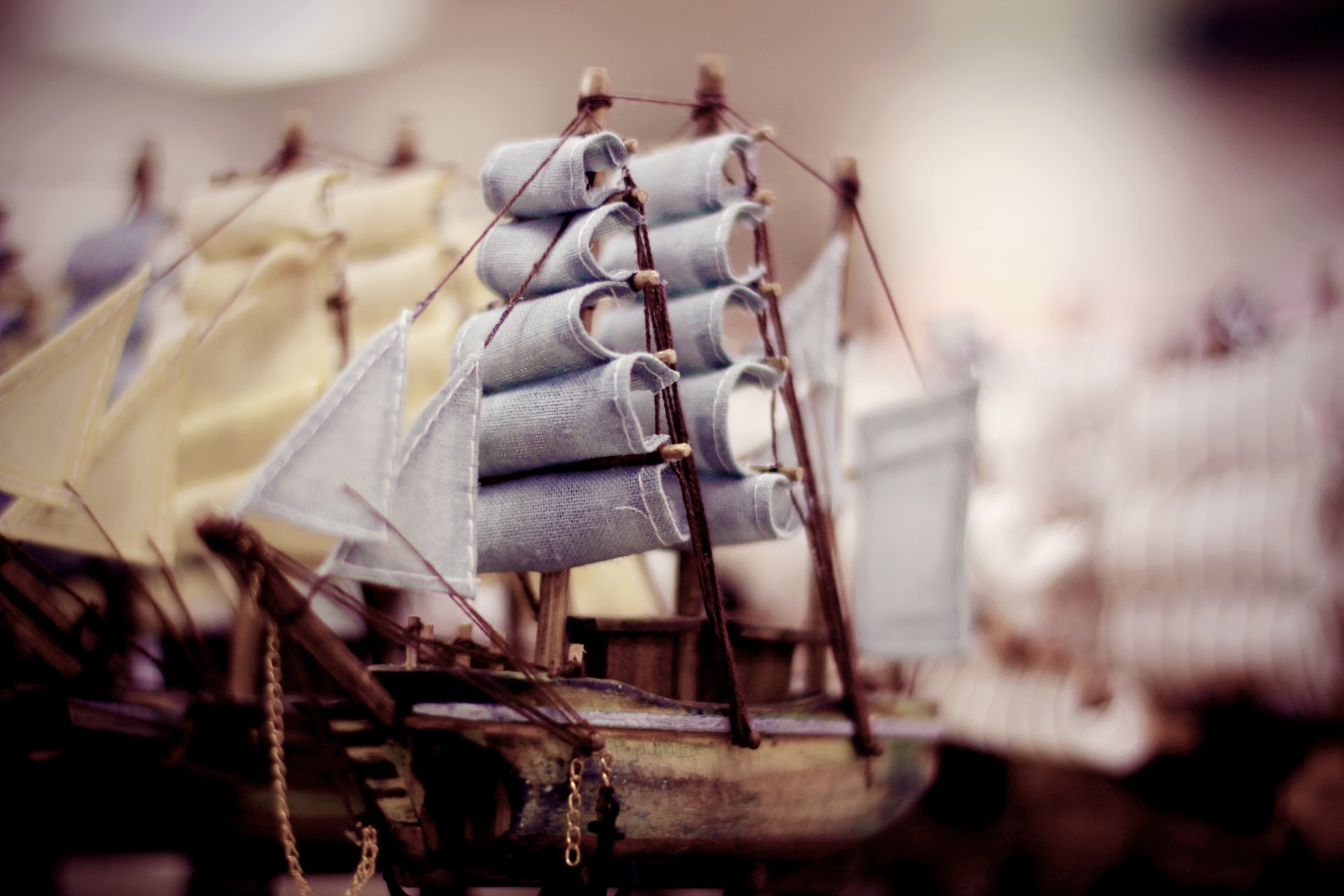 hip boat ships wood toys sail mast blur close up