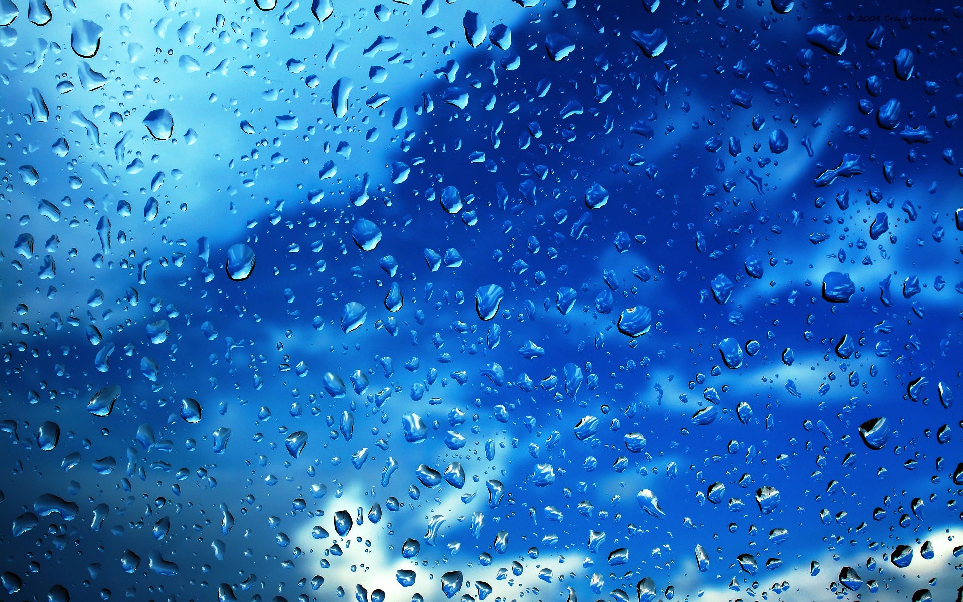 close up drops glass sky cloud