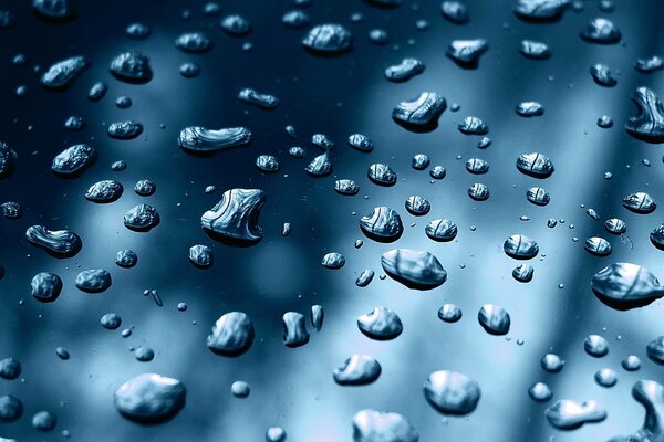 Copious water drops on glass