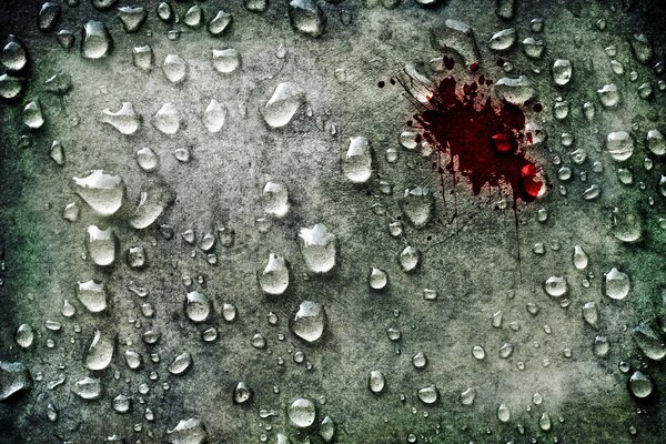 Blood on the background of water droplets