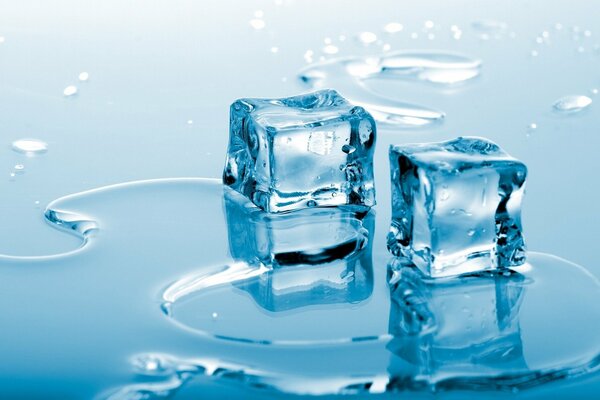 Perfect ice cubes on glass