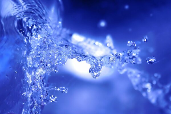 Water splashes on a blue background