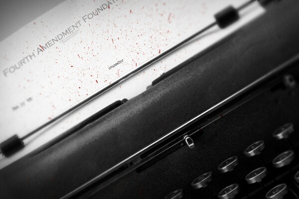 Imagen de la máquina de escribir con botones y letra