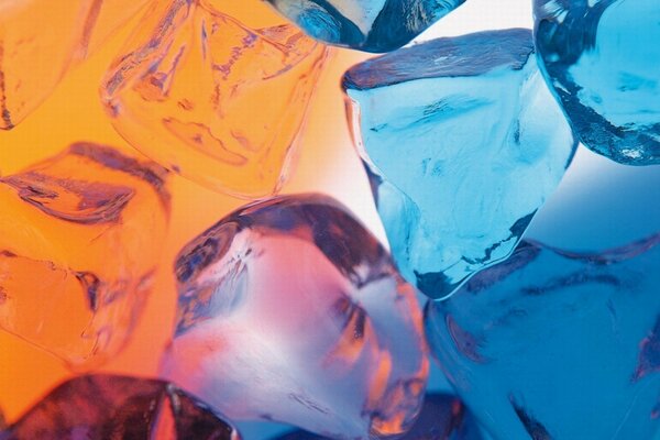 Ice cubes are multicolored in macro shooting