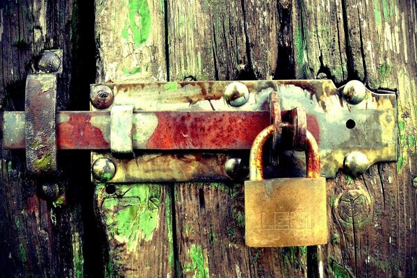 Padlock on the old door