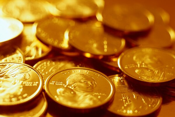 Gold coins with the image of a girl