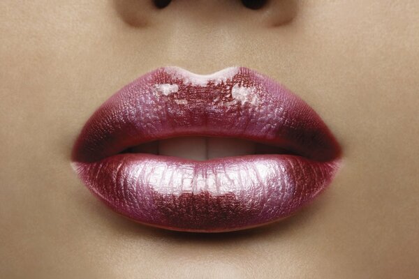 Women s lips painted with lipstick