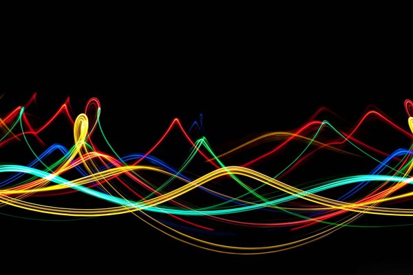 MULTICOLORED LIGHT WAVES ON A BLACK BACKGROUND