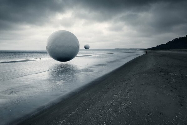 Foto Abstraktion des grauen Strandes. Schal am Meerstrand. Graue Tapete Abstraktion