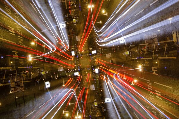 City bustle headlights in motion road