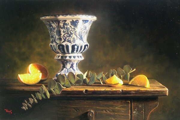 Still-life. Vase and orange on the table