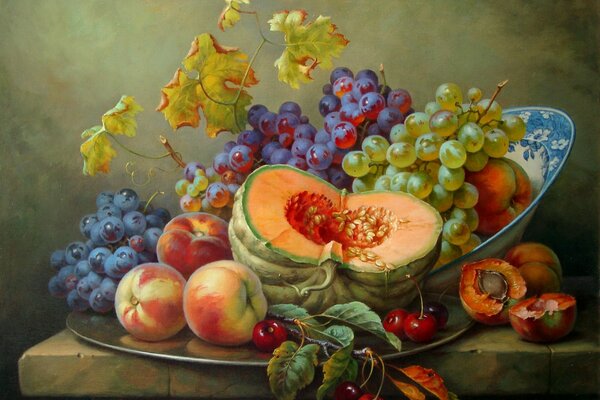 An unusual combination of pumpkin grapes peaches and cherries in a still life