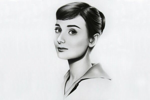 Black and white portrait of Audrey Hepburn