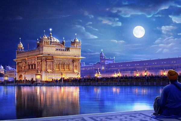 A man looking at a golden temple