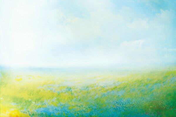 A blooming meadow in the blue sea of the sky