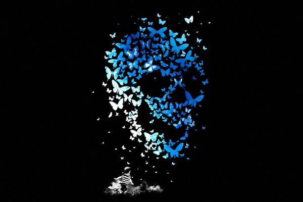 Image of a butterfly skull on a black background