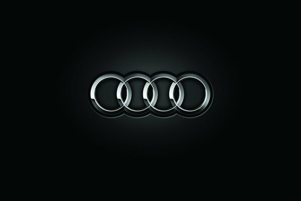 Logo Audi sur fond noir