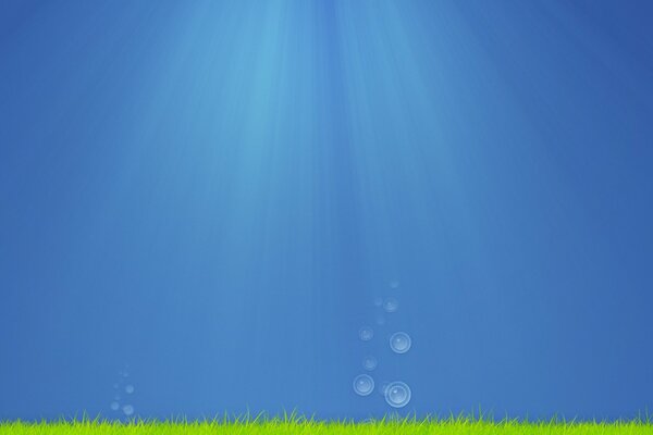 Bubbles under water. Blue Sea