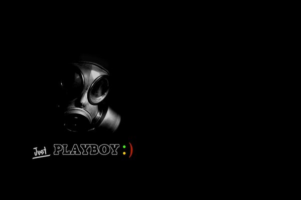 Playboy gas mask on a black background