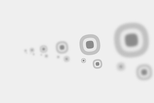 White and gray circles on a white background