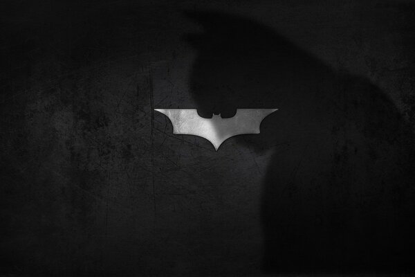 Logo de l ombre de Batman sur fond de chauve-souris