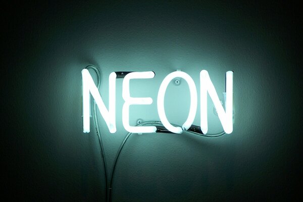 Iscrizione al neon su sfondo nero