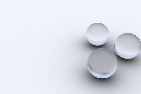 Three balls on a light gray background