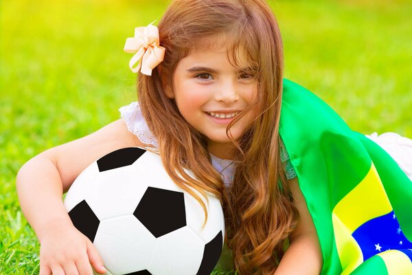 Sunny girl on the football field