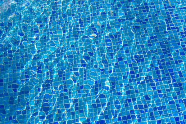 The water in the pool is blue like seawater