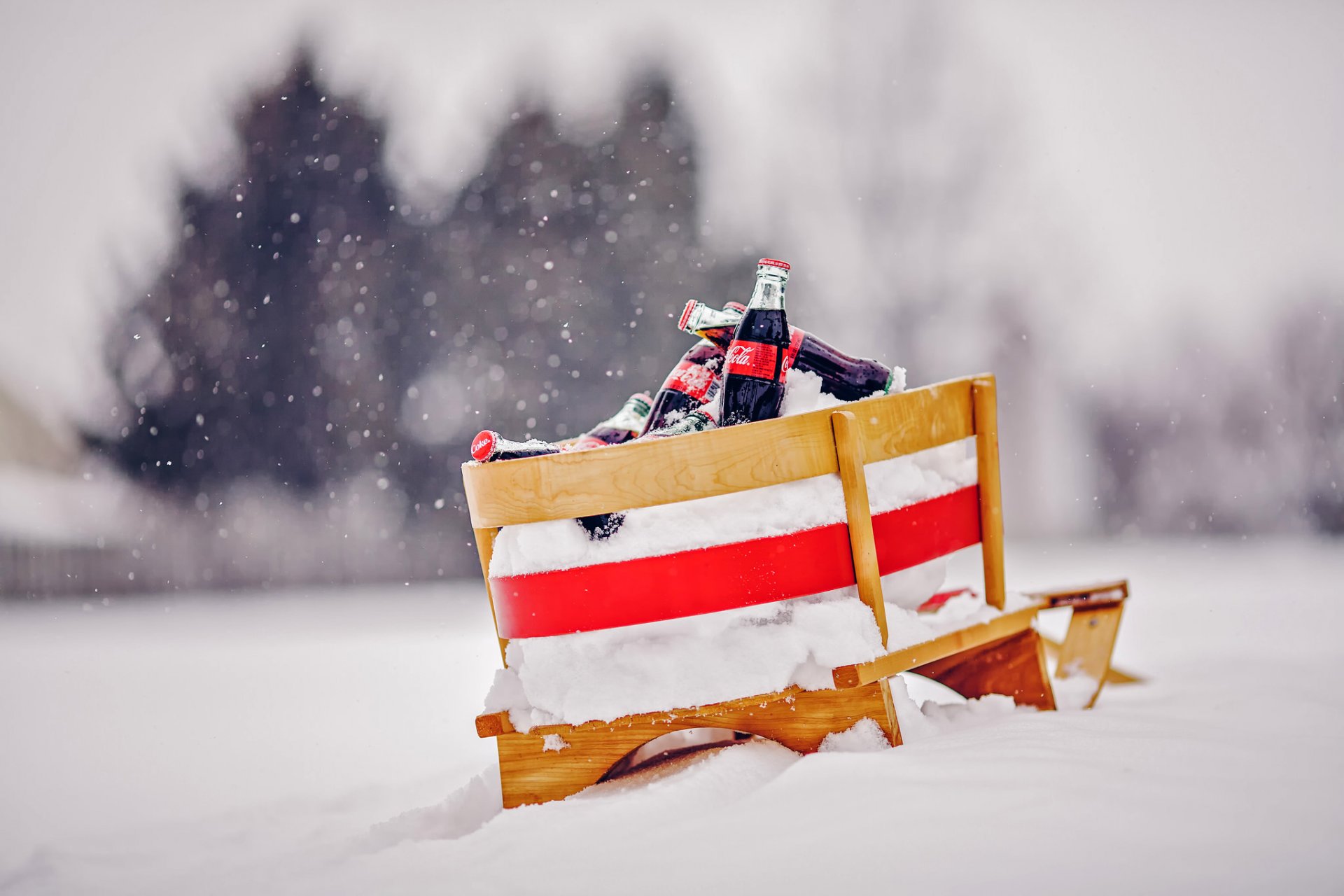 coca-cola bottle of the bottle drink sled snow snowflakes winter