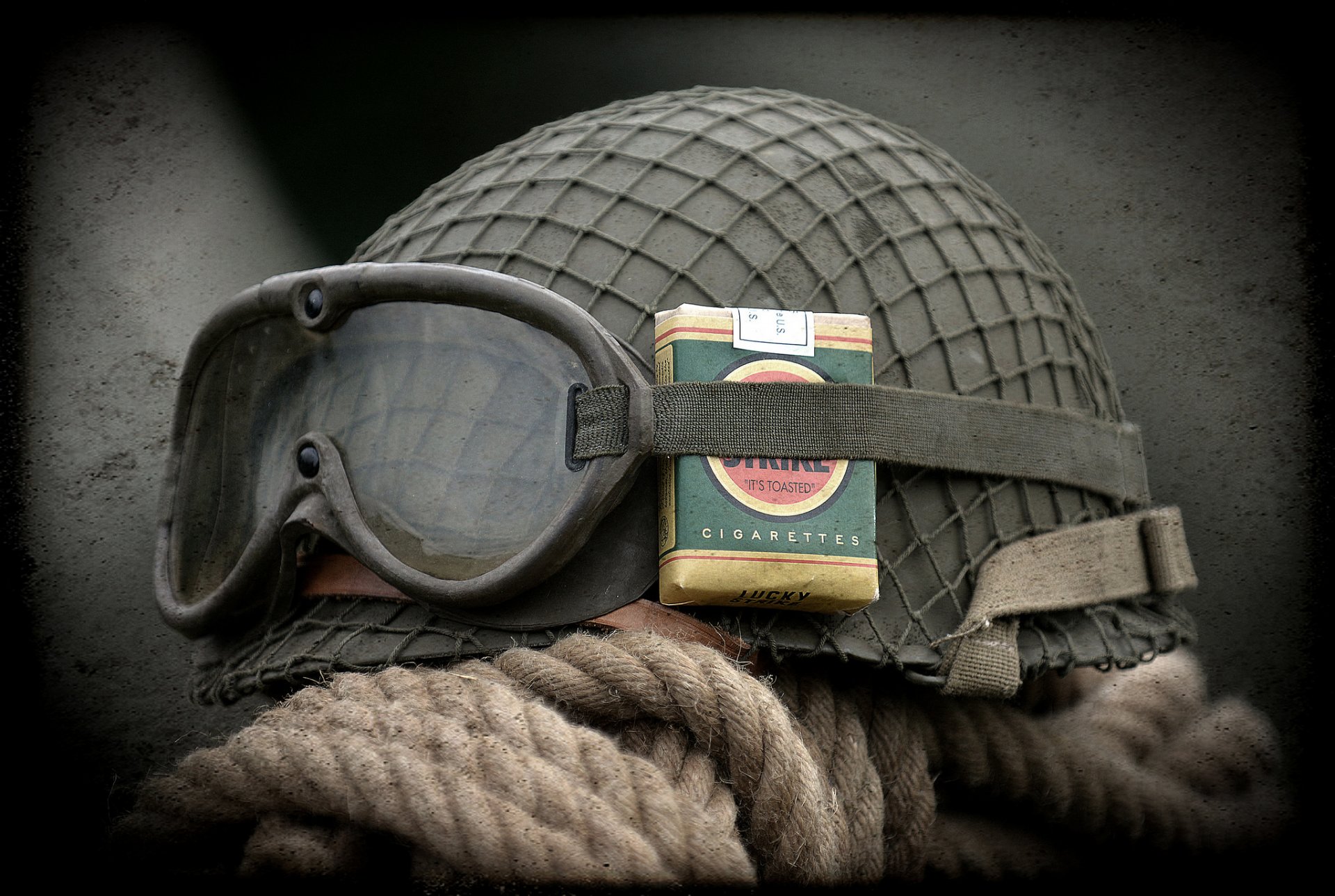 helmet military pack of cigarettes sunglasse