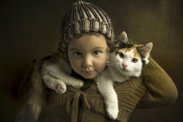 Childhood is when a cat is not a pet but a friend