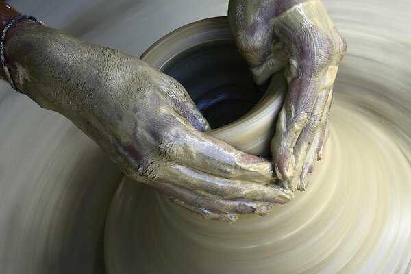 Making a clay product by a potter