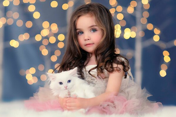 Photo d une fille avec un chat blanc