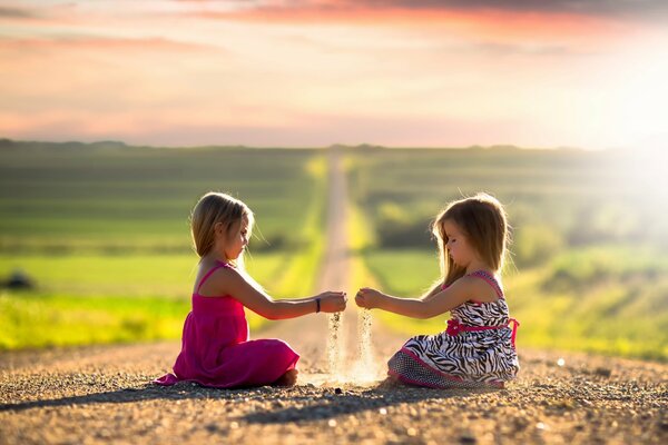 A spacious road and girls under the sun