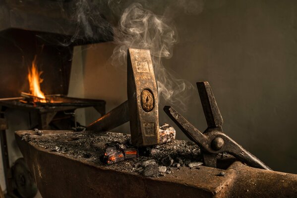 Hammer and anvil at work in the forge