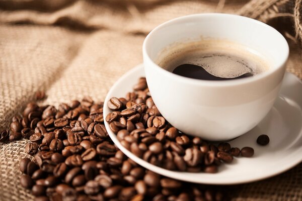 Coffee drink grains in a white cup and saucer