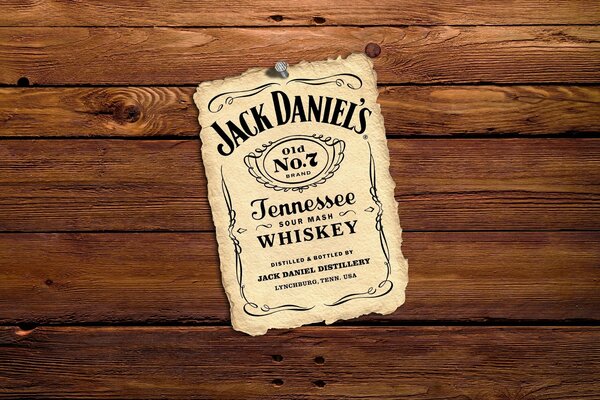 Label from jack Daniels whiskey on a wooden background